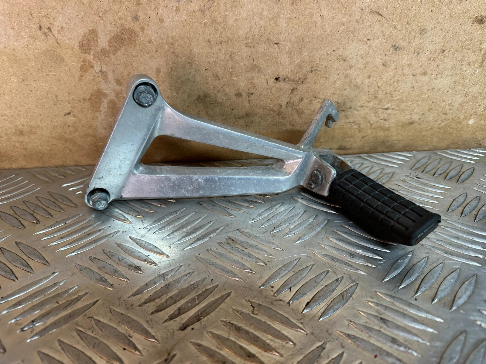Honda CBR125 LH Passenger Foot Rest Hanger & Peg + Original Bolts 2005 CBR 125