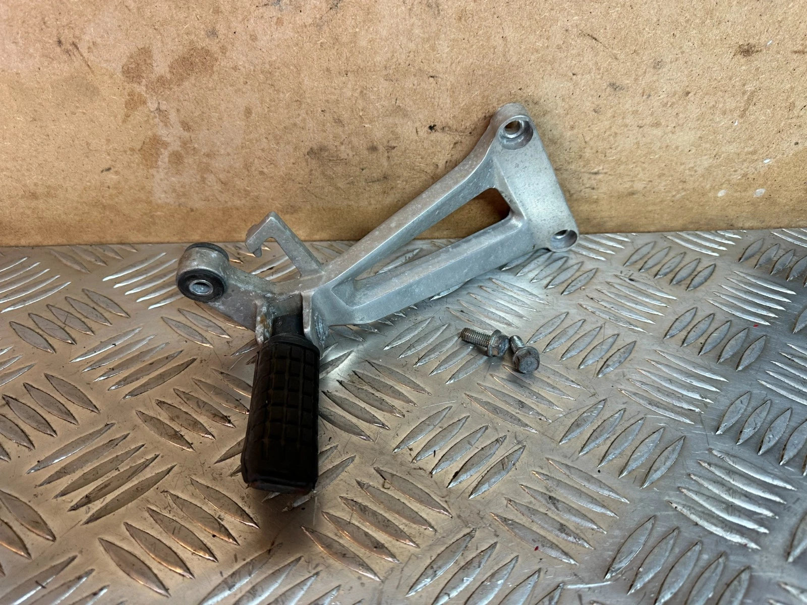 Honda CBR125 RH Passenger Foot Rest Hanger & Peg + Original Bolts 2005 CBR 125